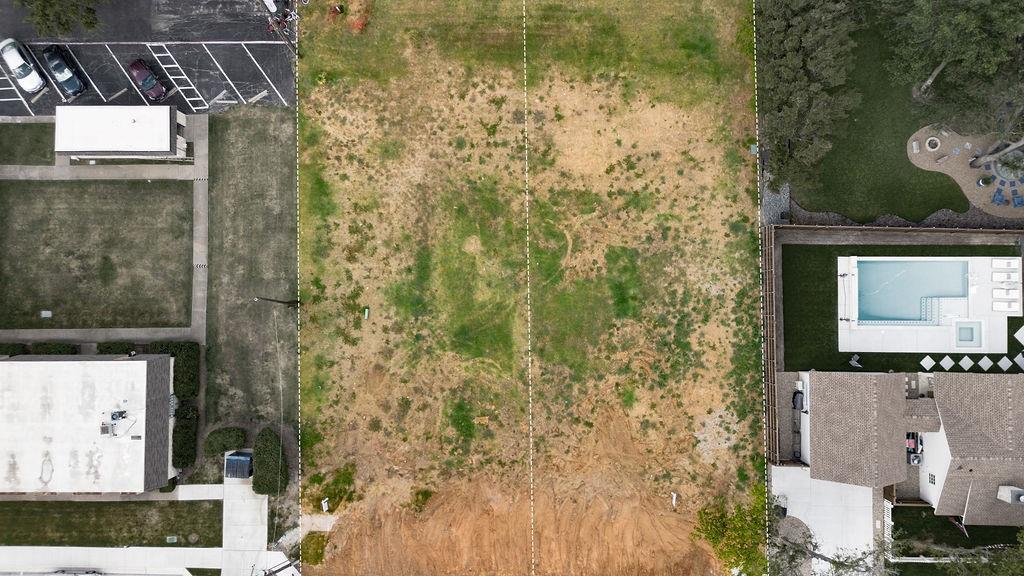 717 East Worth Street Grapevine, TX 76051 - Photo 9 of 18 a bathroom with a shower curtain and a sink