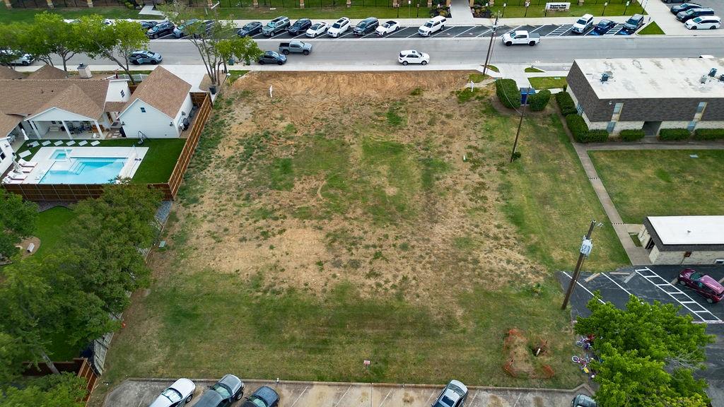717 East Worth Street Grapevine, TX 76051 - Photo 10 of 18 a aerial view of a house with a yard