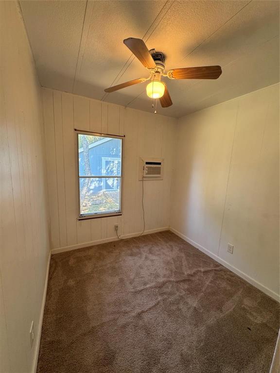 2010 Spring Court Azle, TX 76020 - Photo 16 of 19 an empty room with a window and a fan