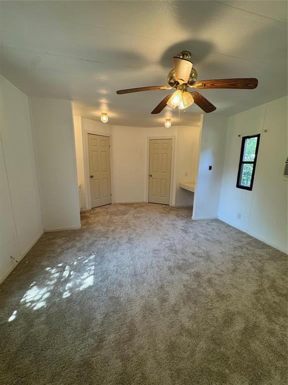 2010 Spring Court Azle, TX 76020 - Photo 9 of 19 a view of a chandelier fan and closet in a room