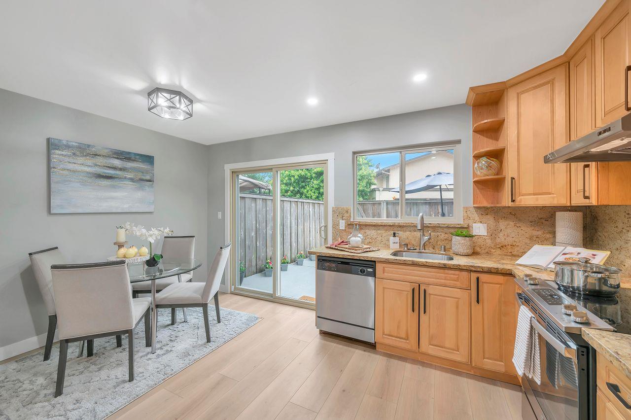1181 Oddstad Boulevard Pacifica, CA 94044 - Photo 12 of 35 a kitchen with a sink and cabinets