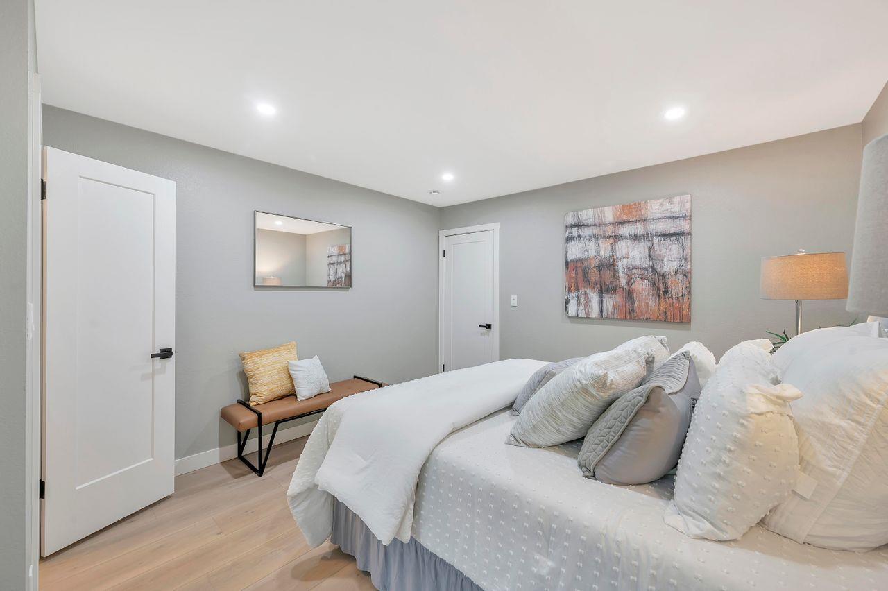 1181 Oddstad Boulevard Pacifica, CA 94044 - Photo 21 of 35 a bedroom with bed and a window