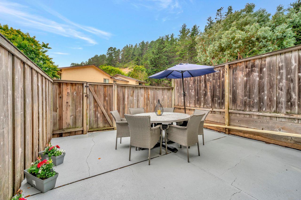 1181 Oddstad Boulevard Pacifica, CA 94044 - Photo 32 of 35 a view of a chairs and table in backyard