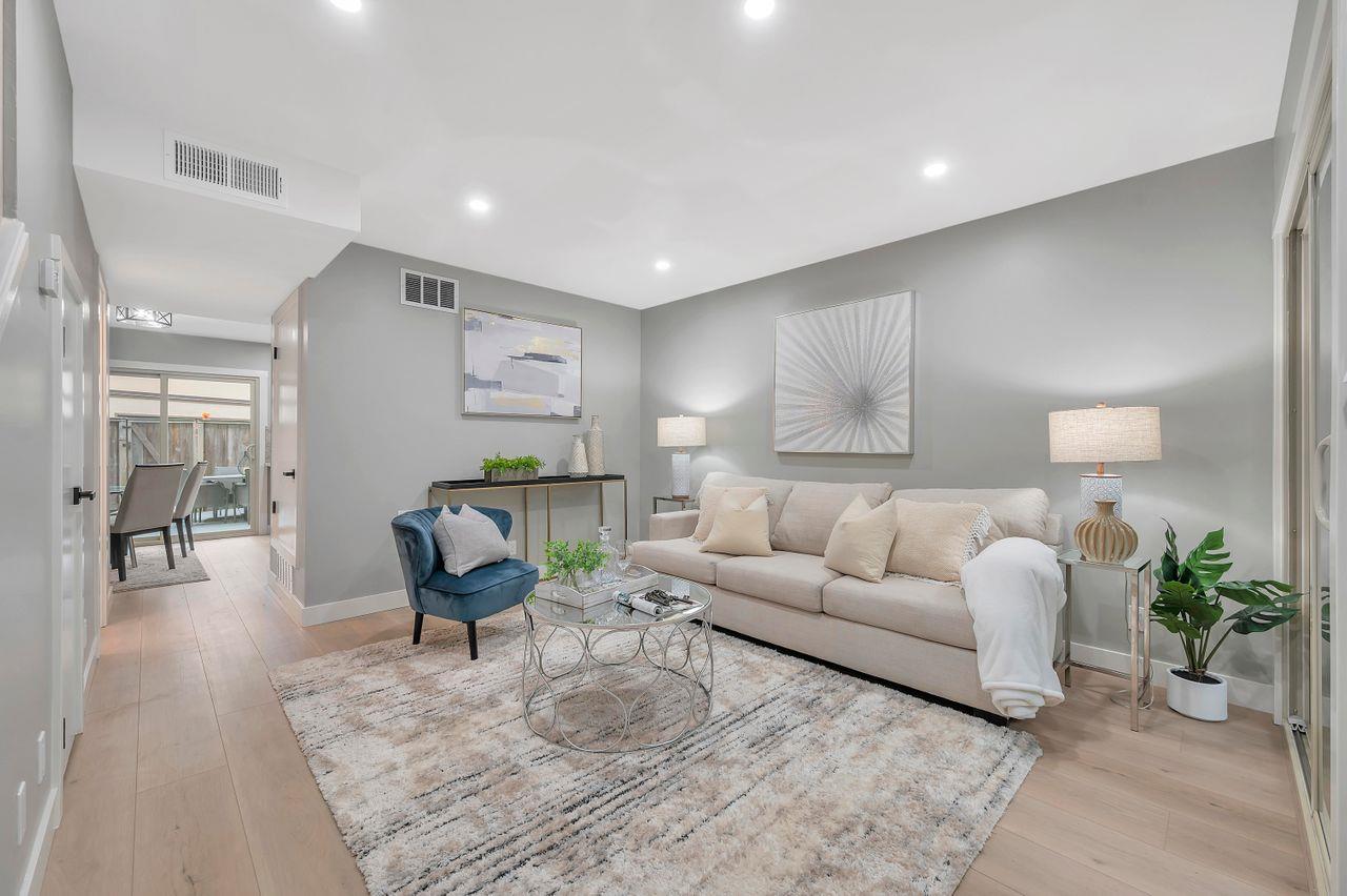 1181 Oddstad Boulevard Pacifica, CA 94044 - Photo 6 of 35 a living room with furniture and wooden floor