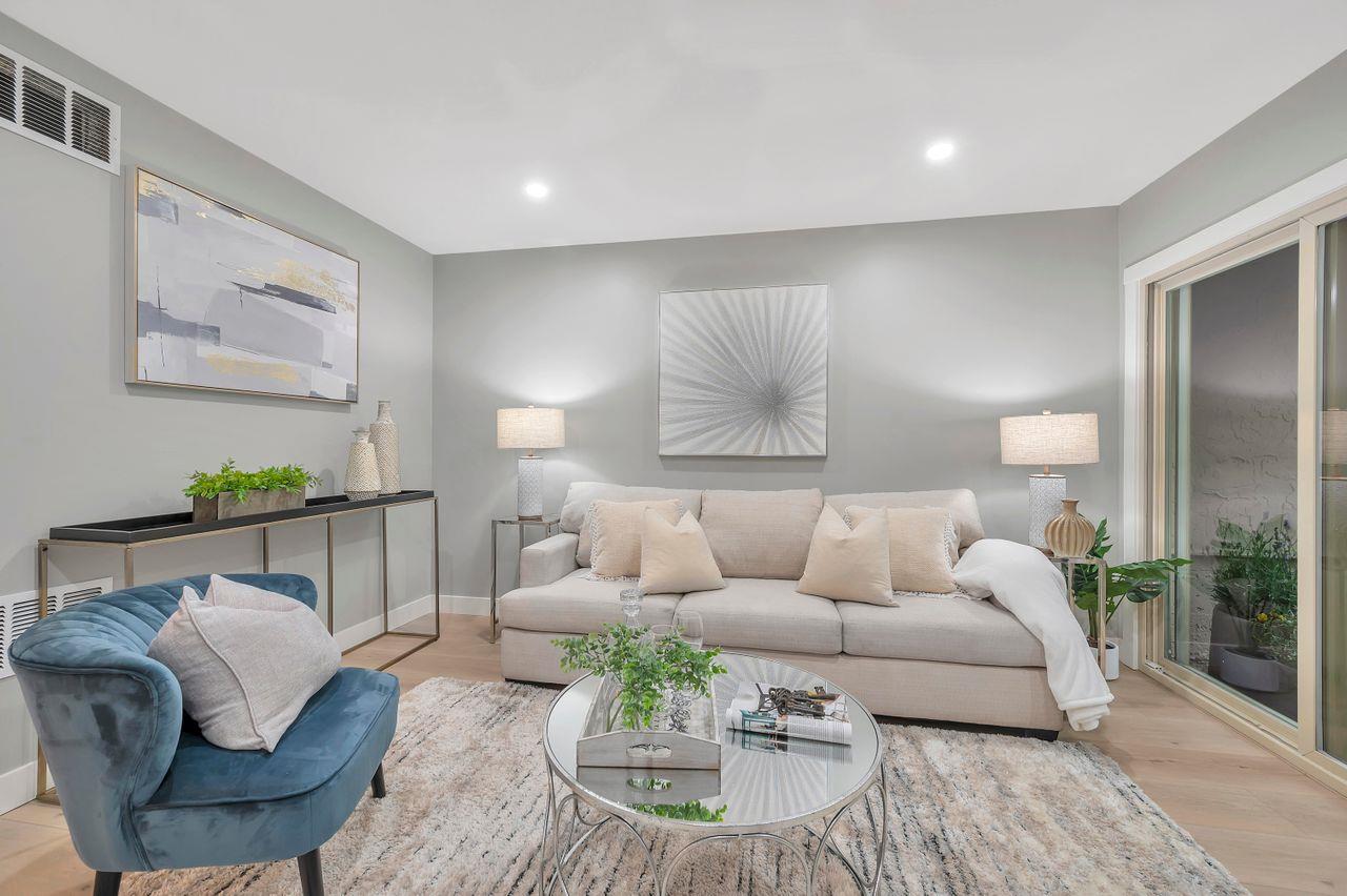 1181 Oddstad Boulevard Pacifica, CA 94044 - Photo 9 of 35 a living room with furniture and a wooden floor