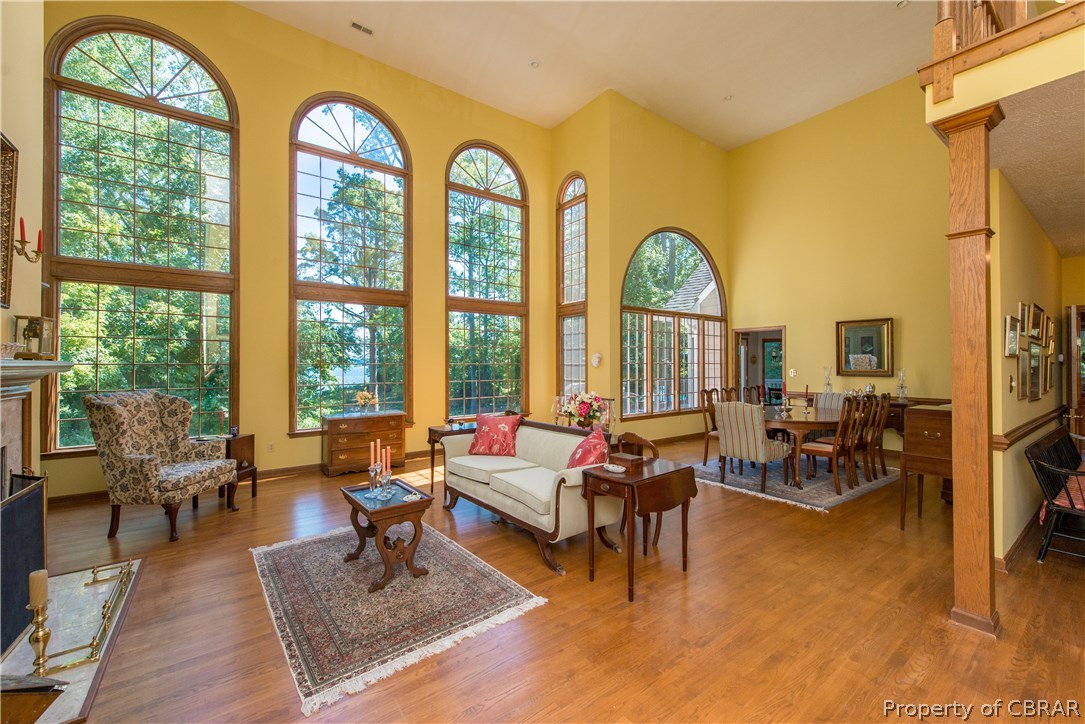 867 Oak Hill Road Lancaster, VA 22503 - Photo 12 of 46 Open Great Room and Dining Room with Large Wall of Windows and Water Views