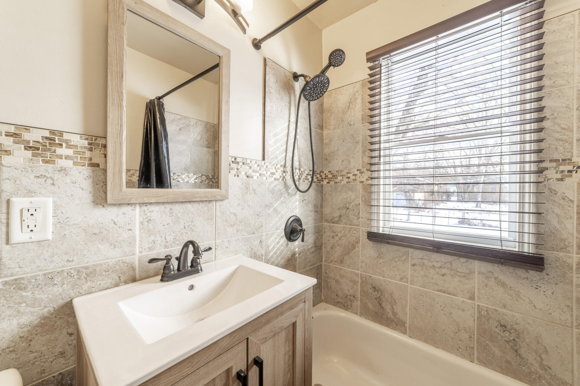 2267 Tennessee Street Gary, IN 46407 - Photo 11 of 22 a bathroom with a sink and a bathtub