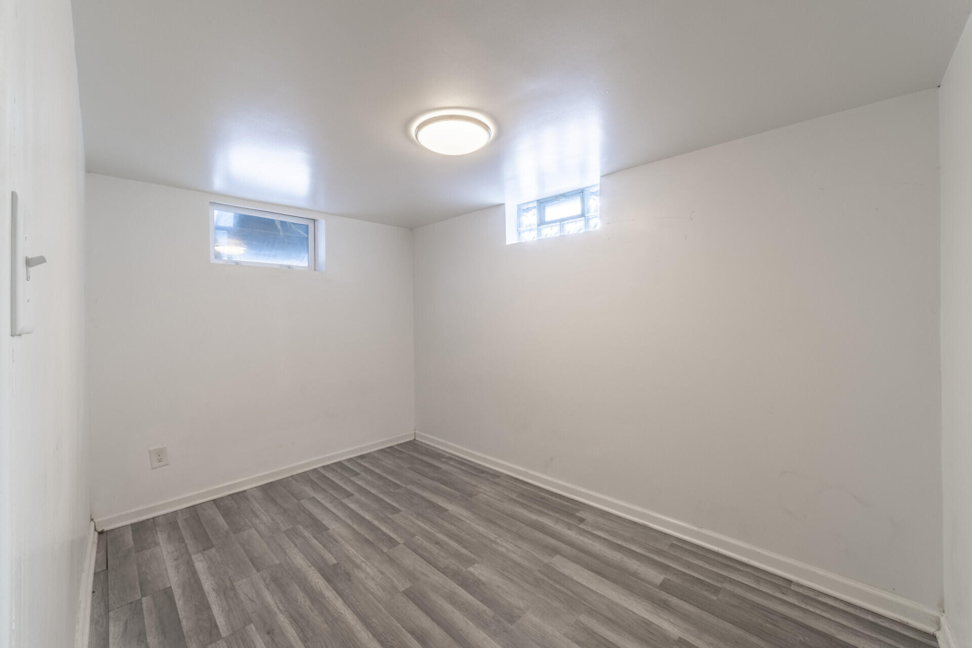 2267 Tennessee Street Gary, IN 46407 - Photo 14 of 22 wooden floor in an empty room