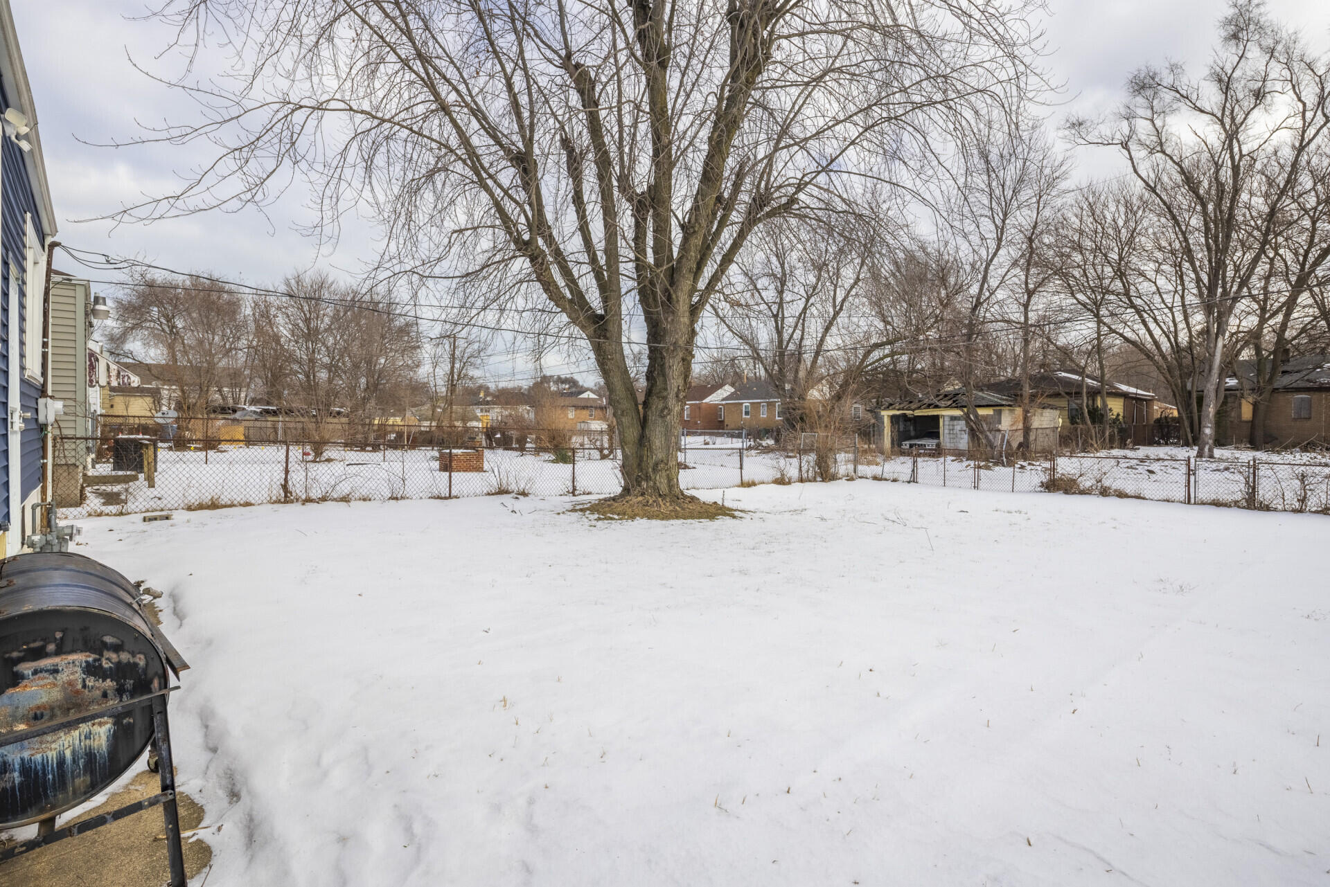 2267 Tennessee Street Gary, IN 46407 - Photo 6 of 22 a view of snow on the side of road