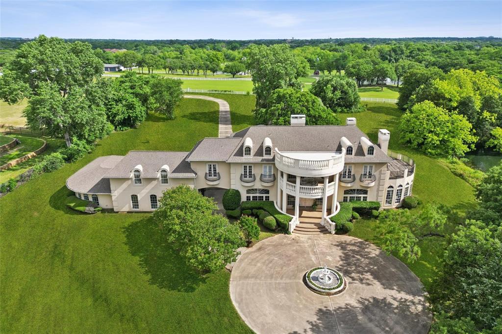 800 John McCain Road Colleyville, TX 76034 - Photo 11 of 38 an aerial view of a house with garden space and outdoor seating