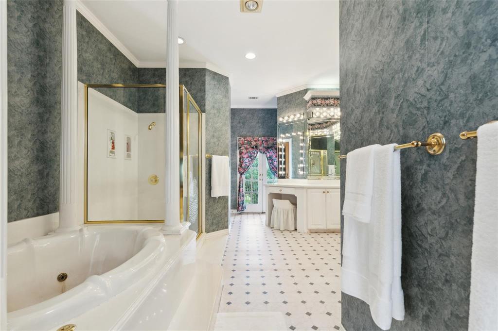 800 John McCain Road Colleyville, TX 76034 - Photo 30 of 38 a bathroom with a bathtub a toilet and a shower