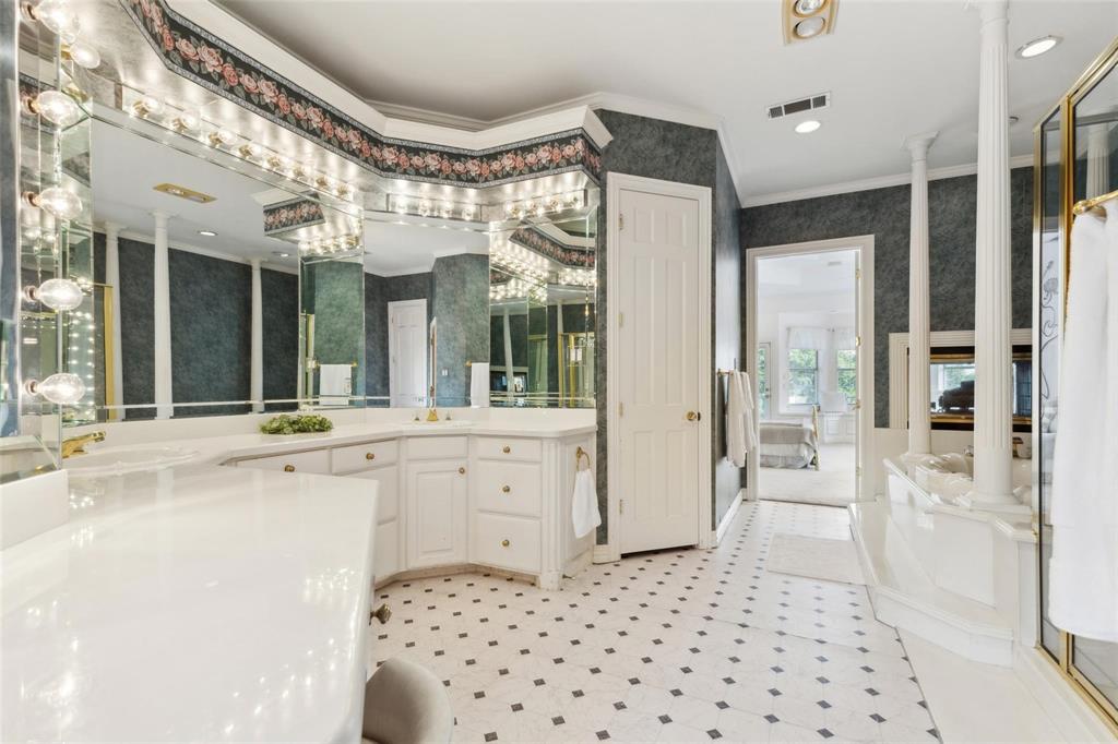 800 John McCain Road Colleyville, TX 76034 - Photo 31 of 38 a bathroom with a bathtub shower sink and mirror