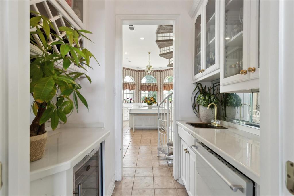 800 John McCain Road Colleyville, TX 76034 - Photo 33 of 38 a kitchen with a counter top space and stainless steel appliances