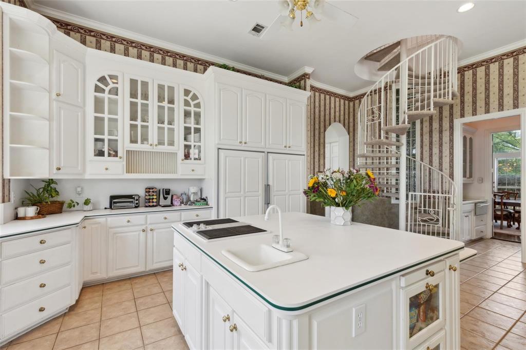 800 John McCain Road Colleyville, TX 76034 - Photo 36 of 38 a kitchen filled with white cabinets and white appliances