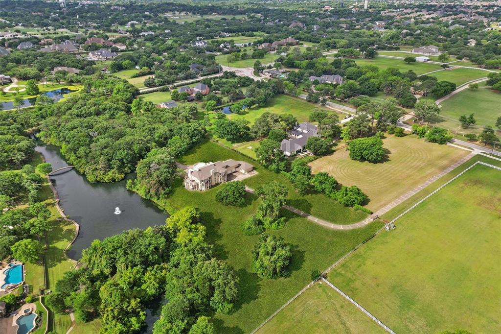 800 John McCain Road Colleyville, TX 76034 - Photo 38 of 38 an aerial view of a residential houses with yard