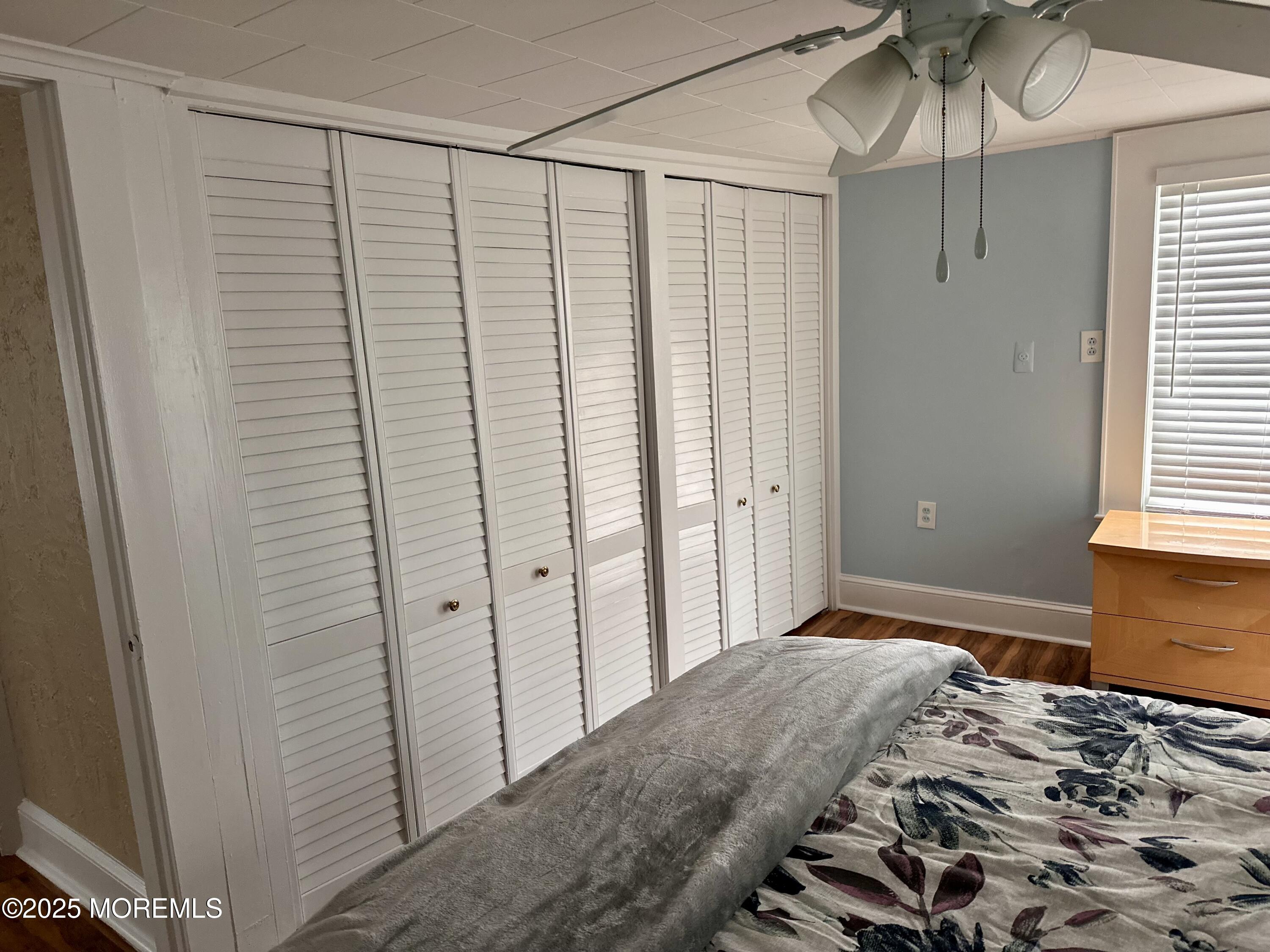 612 Sylvania Avenue Avon-by-the-Sea, NJ 07717 - Photo 8 of 17 a bedroom with a bed and a window
