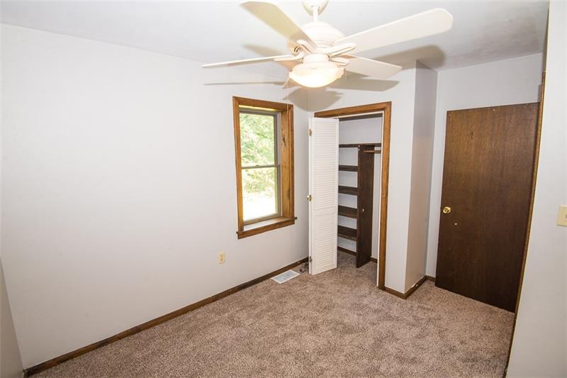 85 McClure Road Cheswick, PA 15024 - Photo 13 of 25 Third bedroom with closet with custom shelfing.