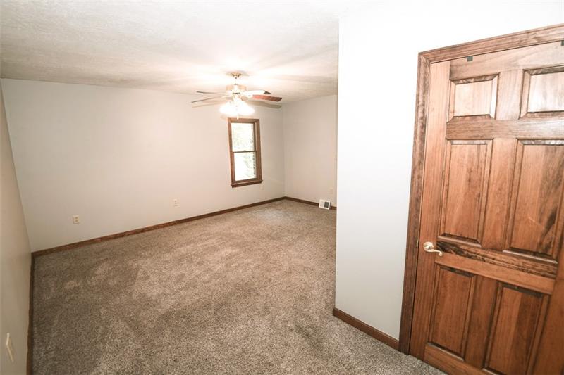 85 McClure Road Cheswick, PA 15024 - Photo 16 of 25 View of master bedroom from outside the bathroom.
