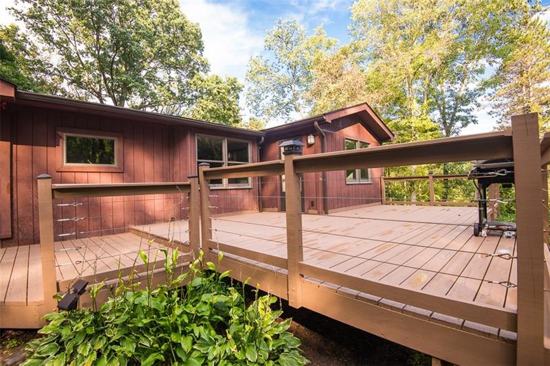 85 McClure Road Cheswick, PA 15024 - Photo 22 of 25 Huge deck just recently stained with modern railings.