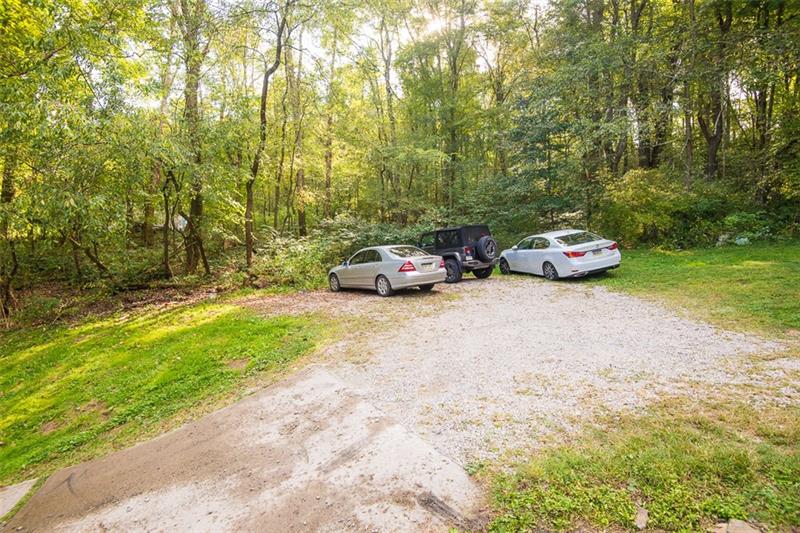 85 McClure Road Cheswick, PA 15024 - Photo 23 of 25 Large parking area perfect for cars, trucks, etc. Additional parking on other side of driveway.