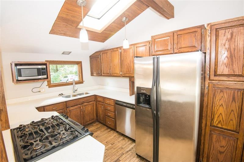 85 McClure Road Cheswick, PA 15024 - Photo 8 of 25 Updated kitchen with newer appliances and quartz counters!