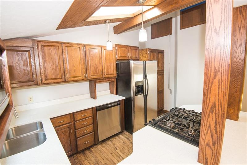 85 McClure Road Cheswick, PA 15024 - Photo 9 of 25 View of kitchen showing the vaulted ceiling.