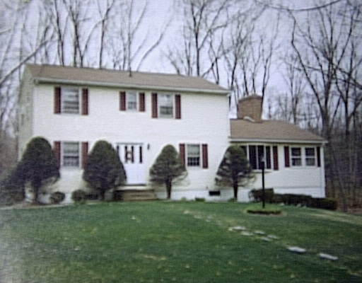 14 Hemingway Road Wilbraham, MA 01095 - Photo 1 of 1 a front view of house with yard and green space