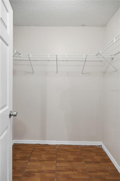 14 Cedar Tree Terrace Ocala, FL 34472 - Photo 18 of 32 a view of a room with racks on the wall