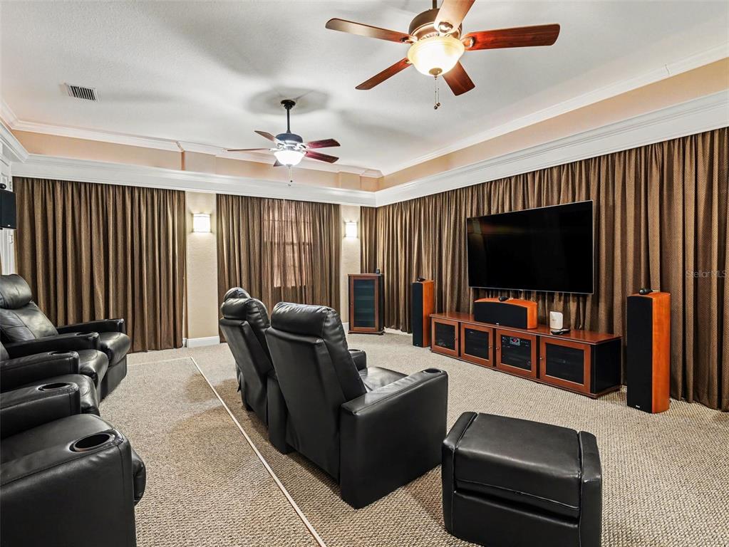 339 Corbett Road Lithia, FL 33547 - Photo 27 of 38 a living room with furniture and a flat screen tv