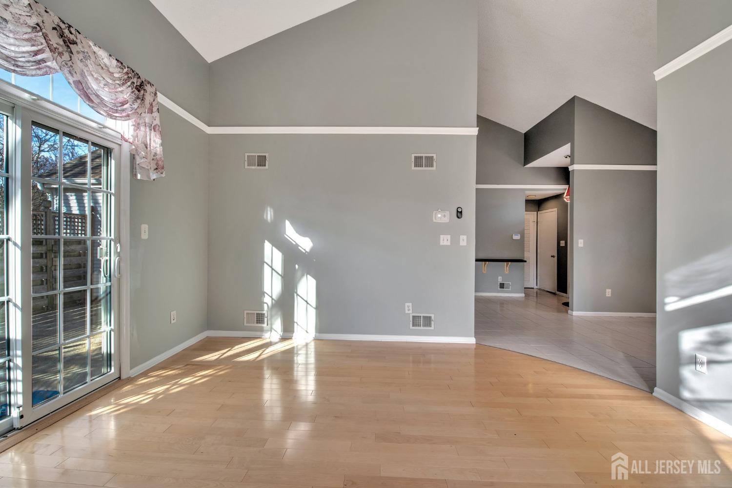 30 Winthrop Road Monroe Township, NJ 08831 - Photo 12 of 42 a view of a livingroom with an empty space and a window