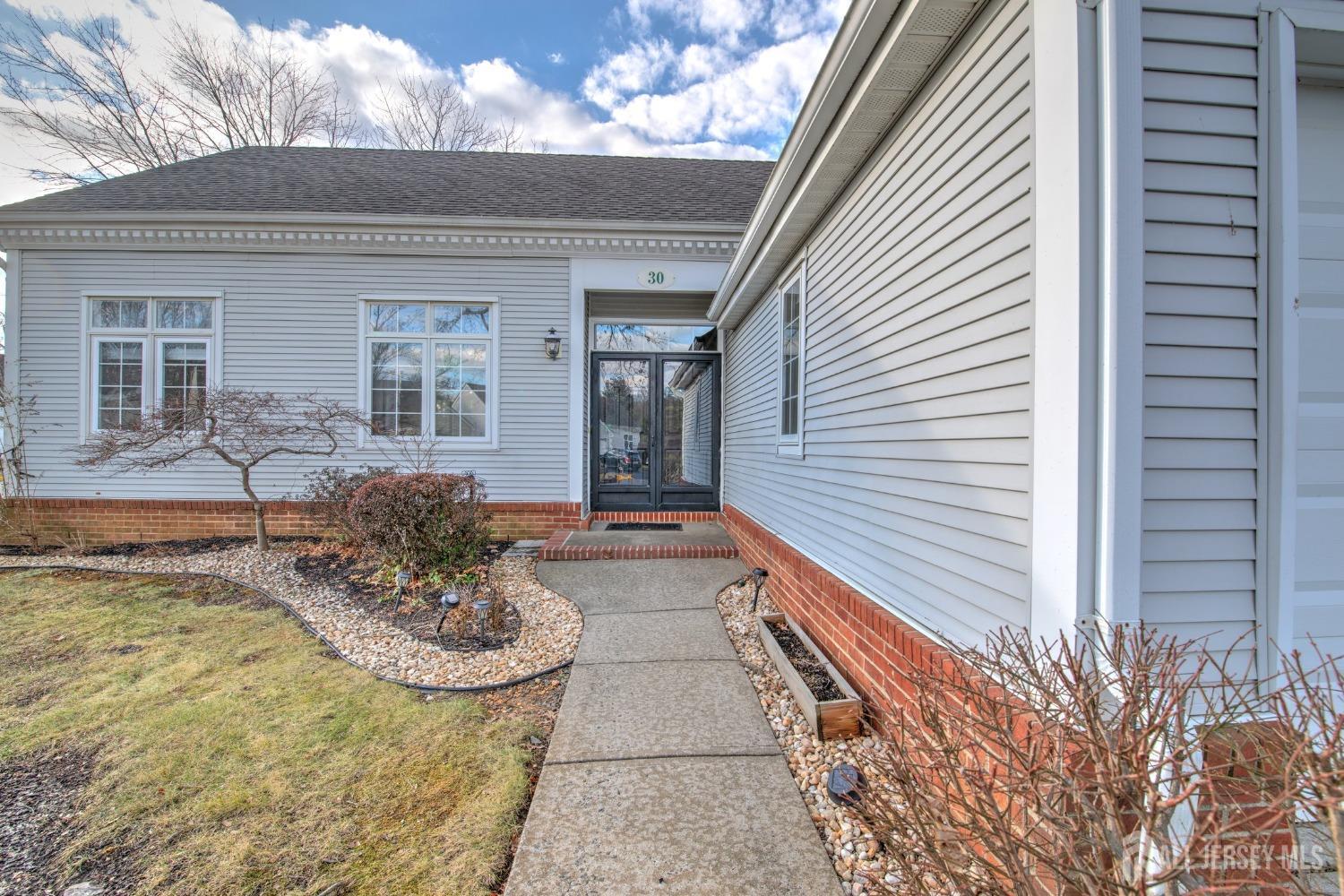 30 Winthrop Road Monroe Township, NJ 08831 - Photo 2 of 42 a view of a house with backyard and sitting area