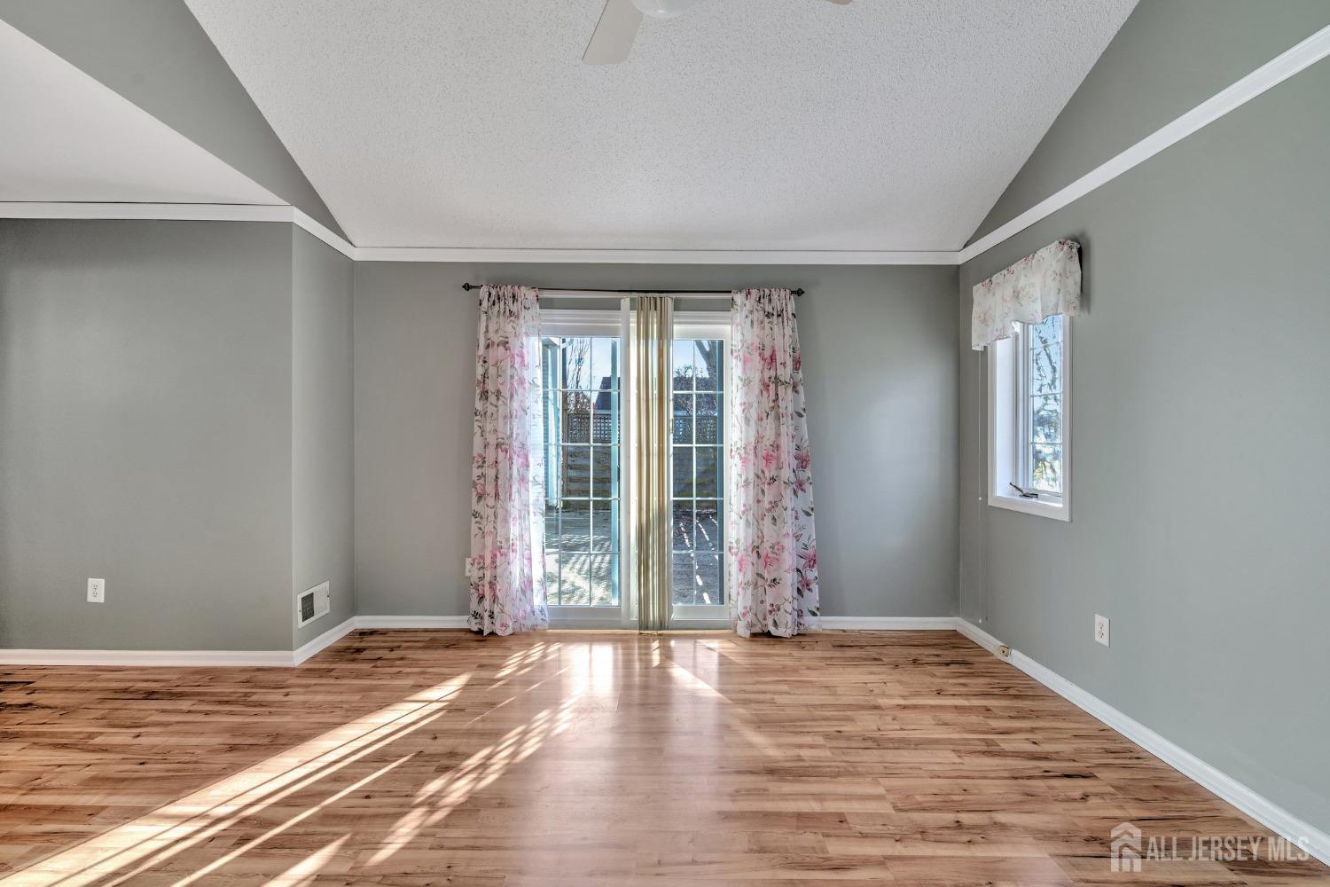 30 Winthrop Road Monroe Township, NJ 08831 - Photo 21 of 42 a view of a livingroom with wooden floor and a window