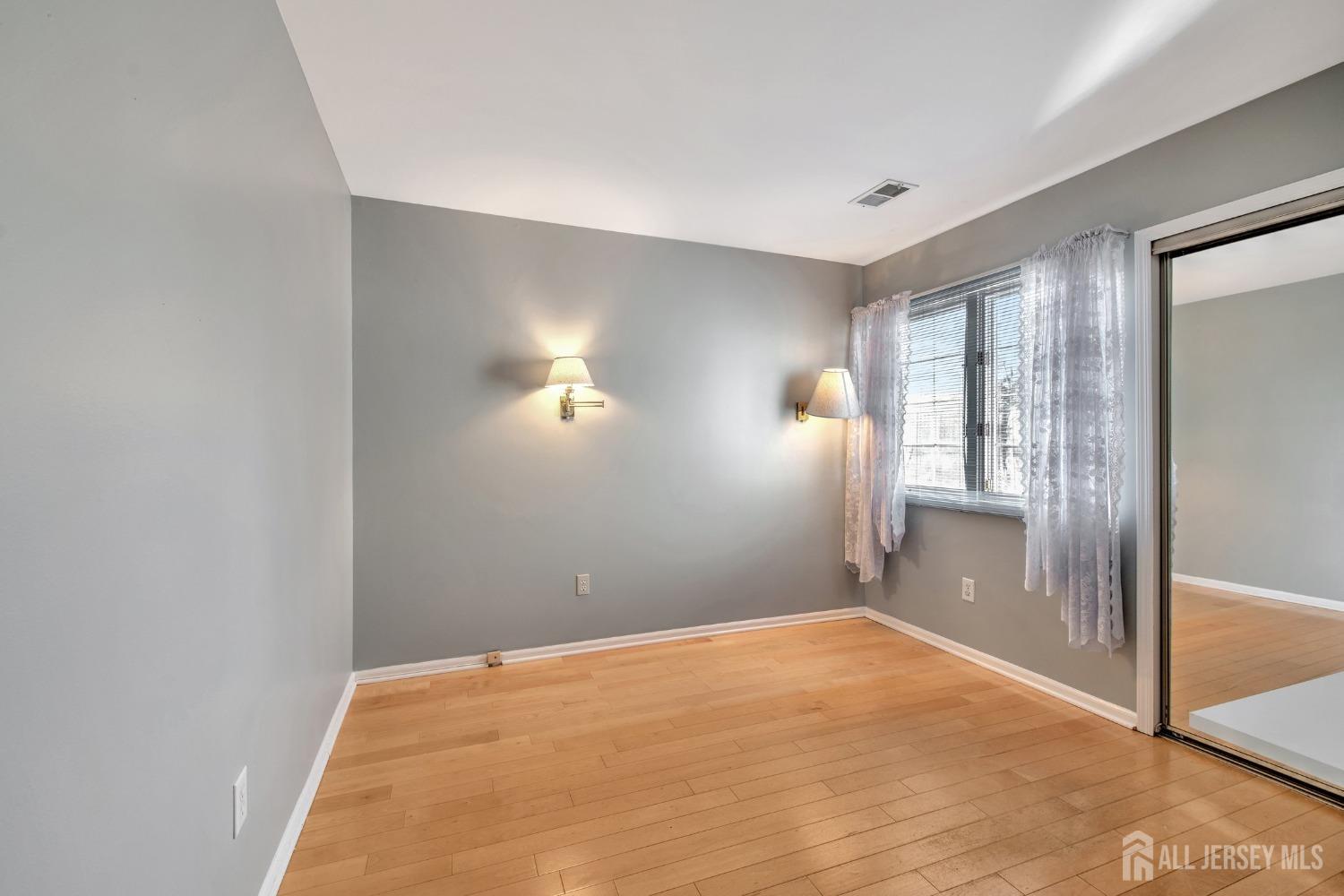30 Winthrop Road Monroe Township, NJ 08831 - Photo 25 of 42 a view of empty room with wooden floor