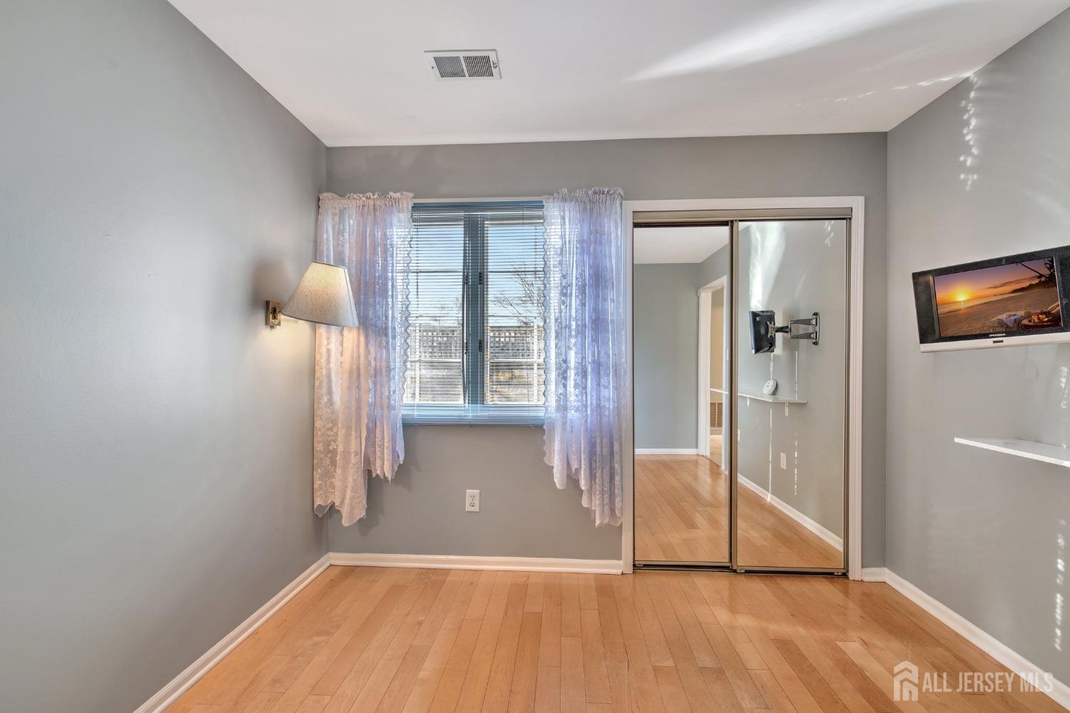 30 Winthrop Road Monroe Township, NJ 08831 - Photo 26 of 42 a view of empty room with wooden floor