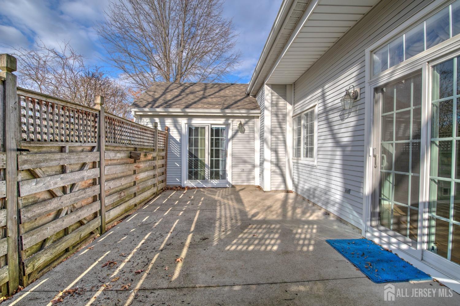 30 Winthrop Road Monroe Township, NJ 08831 - Photo 31 of 42 a view of a brick house with many windows