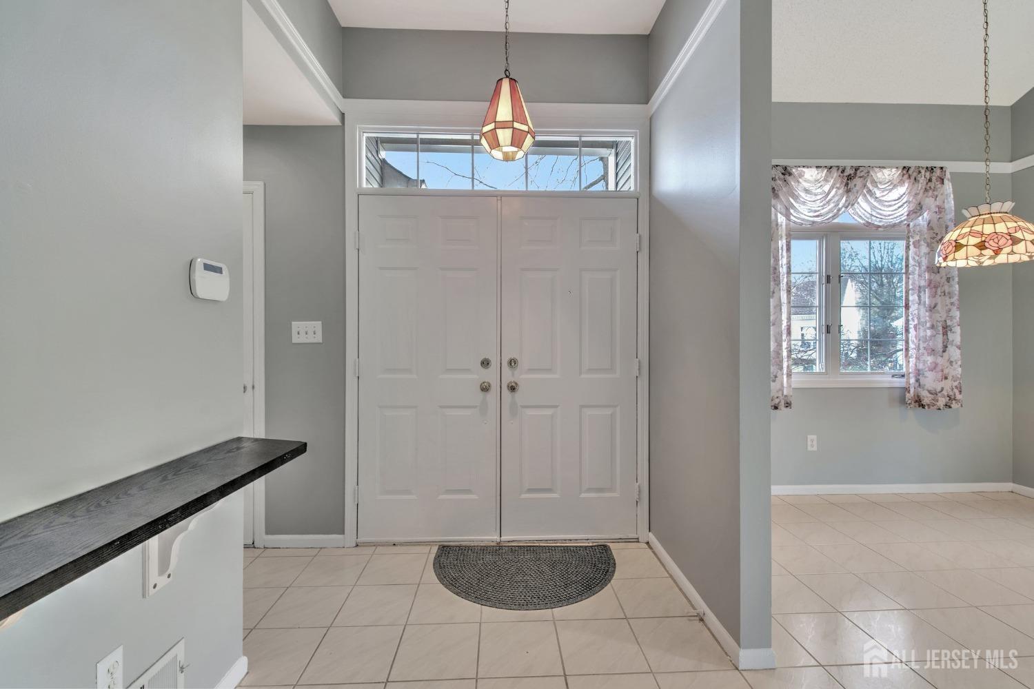 30 Winthrop Road Monroe Township, NJ 08831 - Photo 6 of 42 a view of entryway and kitchen