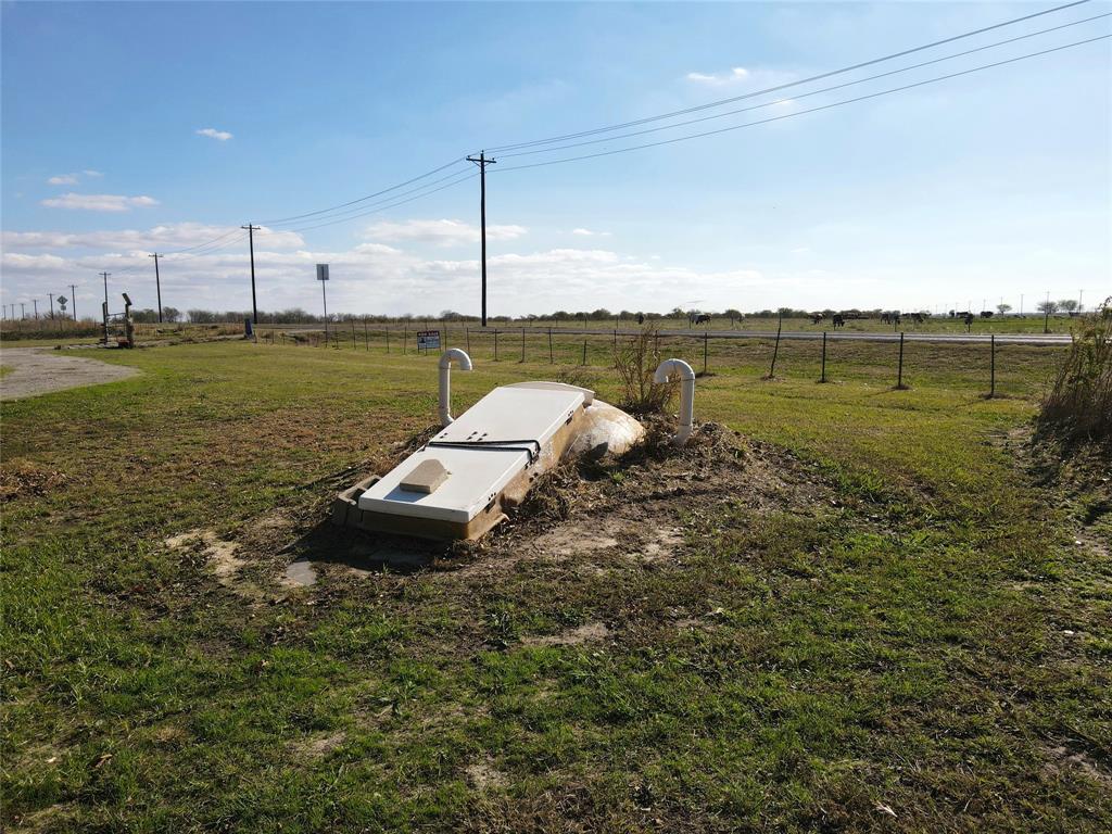 16531 Farm To Market 455 Pilot Point, TX 76258 - Photo 23 of 37 View of storm shelter with a rural view