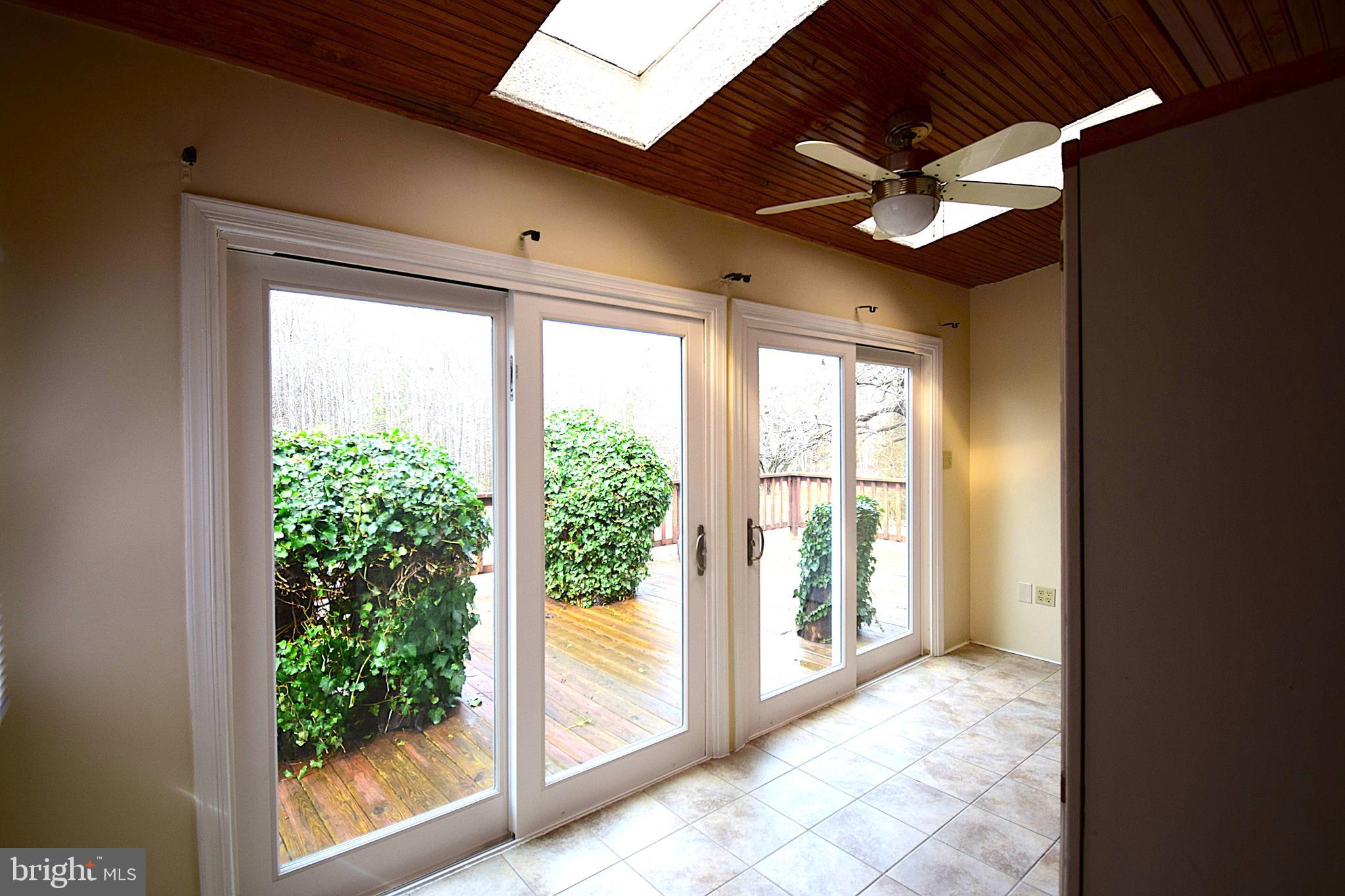 26554 Signboard Road Ruther Glen, VA 22546 - Photo 8 of 24 light filled sun porch