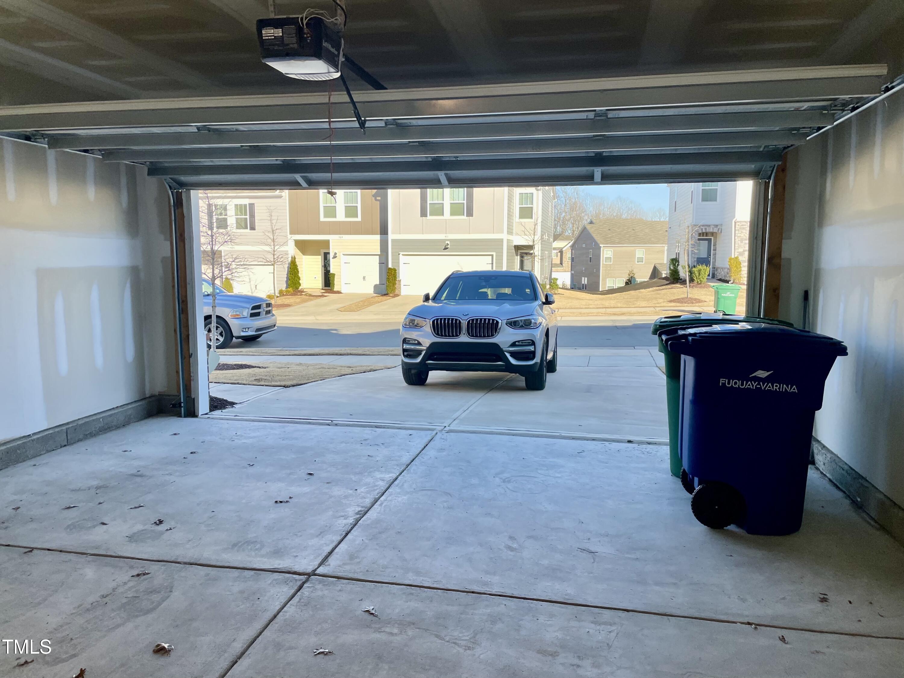 912 Field Ivy Drive Fuquay-Varina, NC 27526 - Photo 18 of 27 a car parked in a parking garage