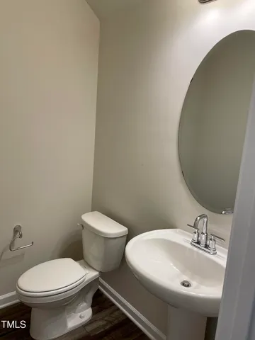 an empty room with closet area