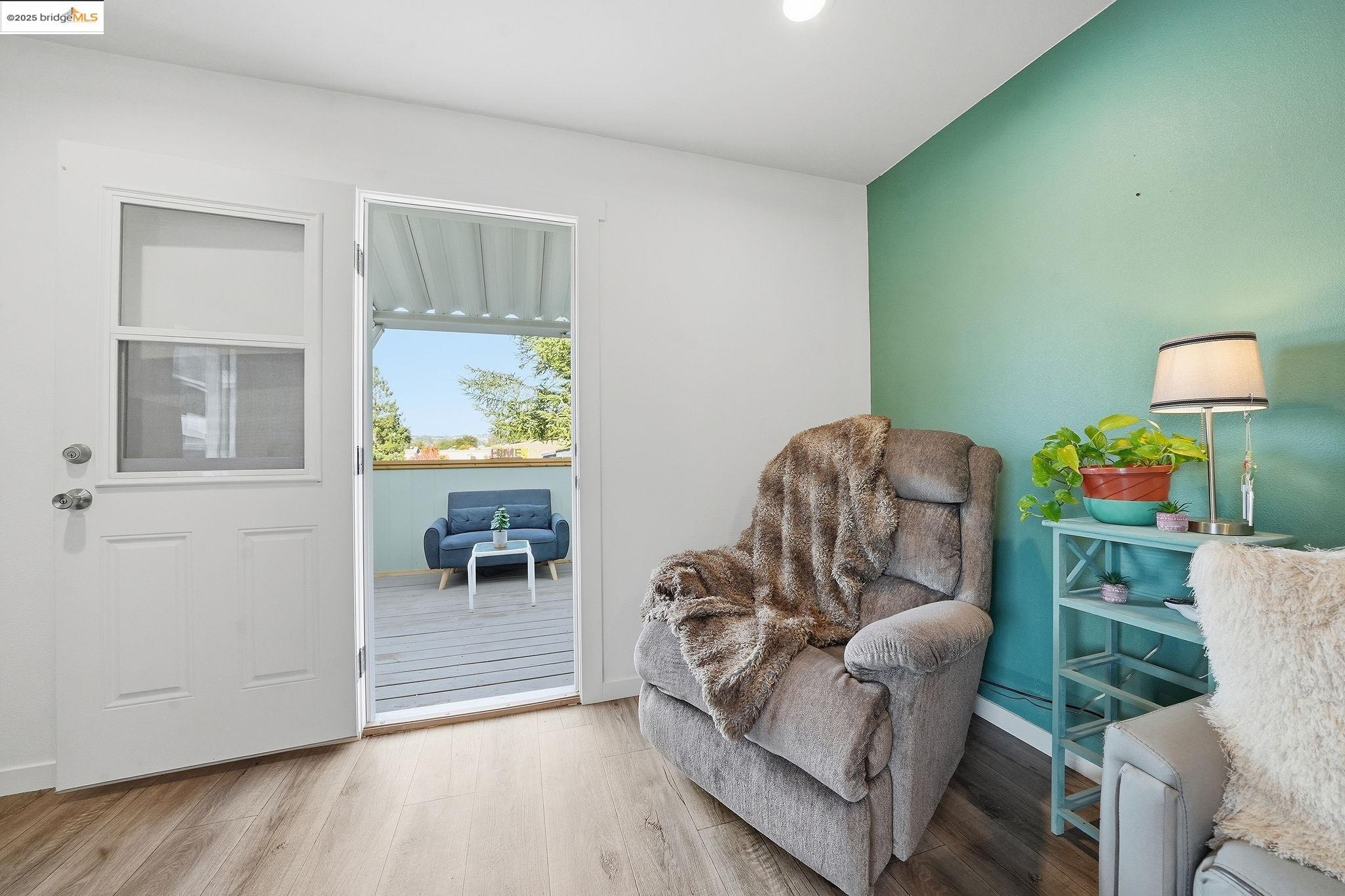 150 Clinton Road Jackson, CA 95642 - Photo 19 of 44 Sitting room with wood finished floors and baseboards