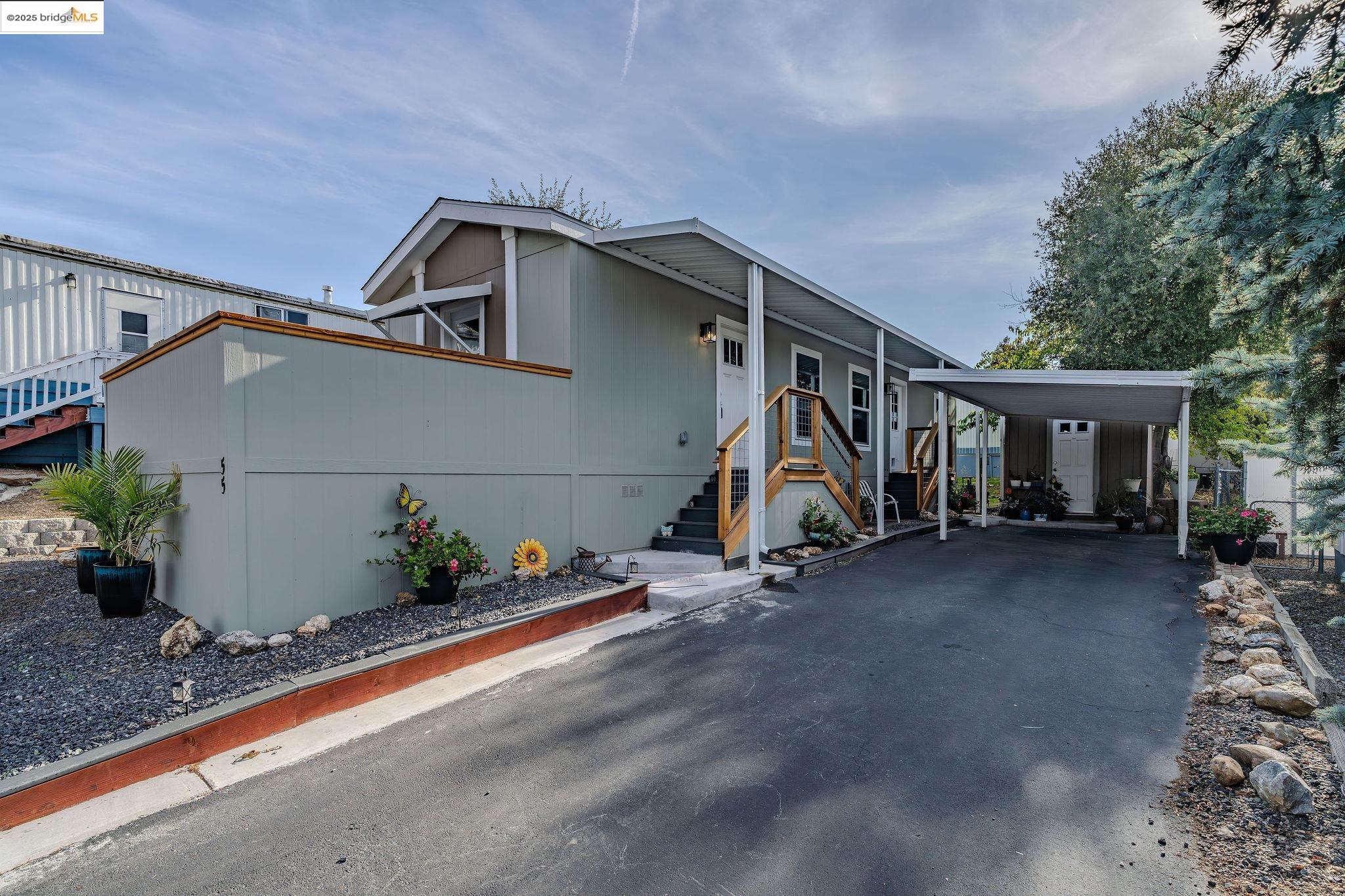 150 Clinton Road Jackson, CA 95642 - Photo 2 of 44 Manufactured / mobile home with asphalt driveway