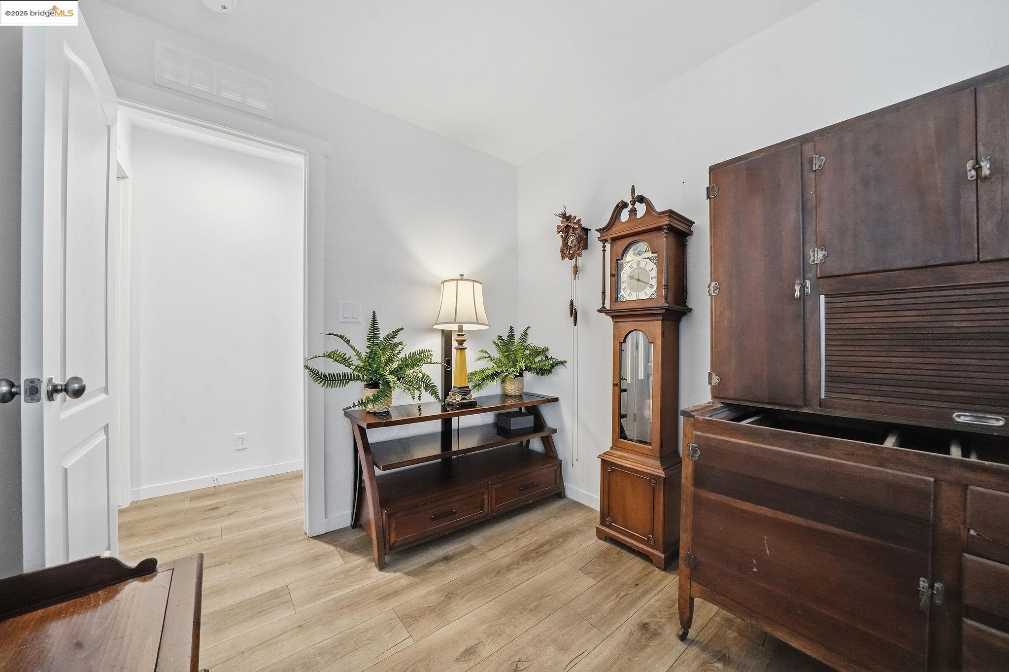 150 Clinton Road Jackson, CA 95642 - Photo 33 of 44 Living area with light wood-type flooring and baseboards