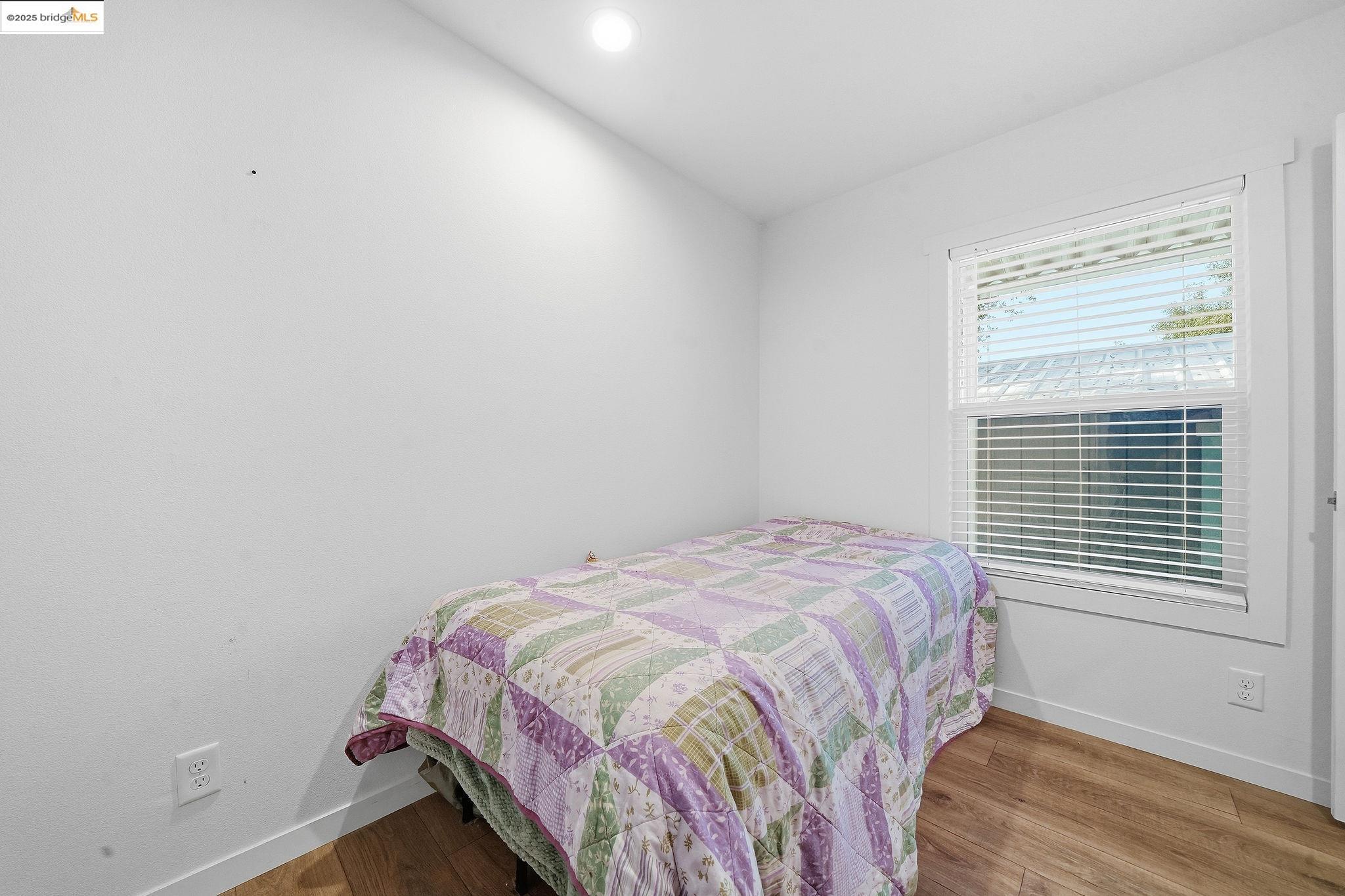 150 Clinton Road Jackson, CA 95642 - Photo 37 of 44 Bedroom featuring wood finished floors and recessed lighting