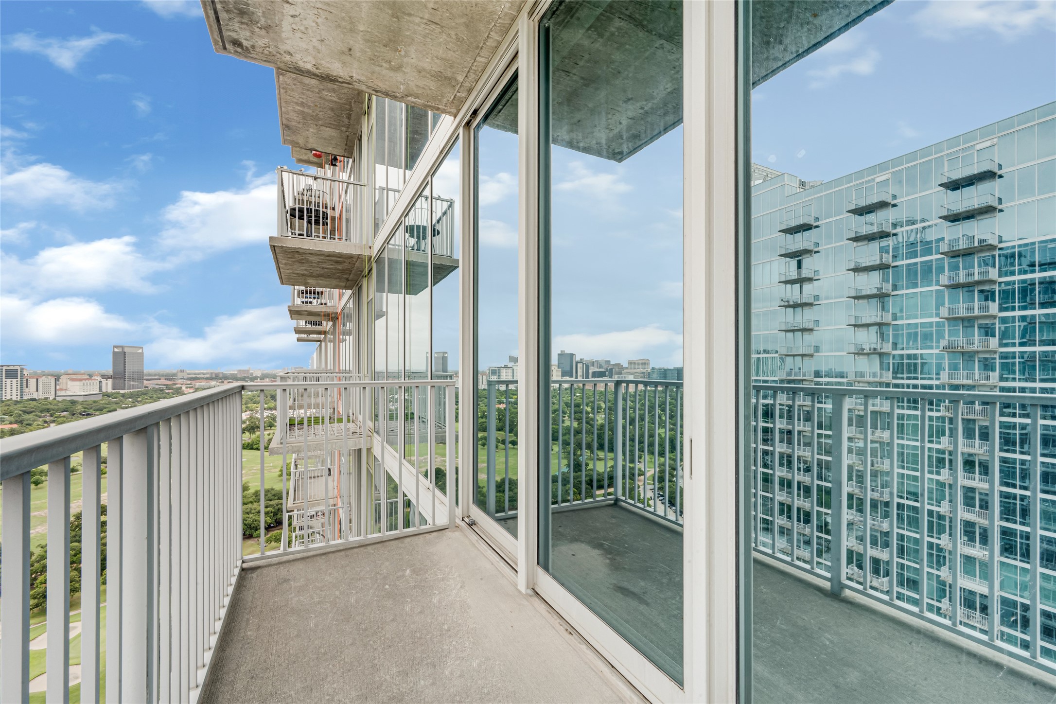 5925 Almeda Road, Unit 12308 Houston, TX 77004 - Photo 15 of 48 a view of balcony with couch