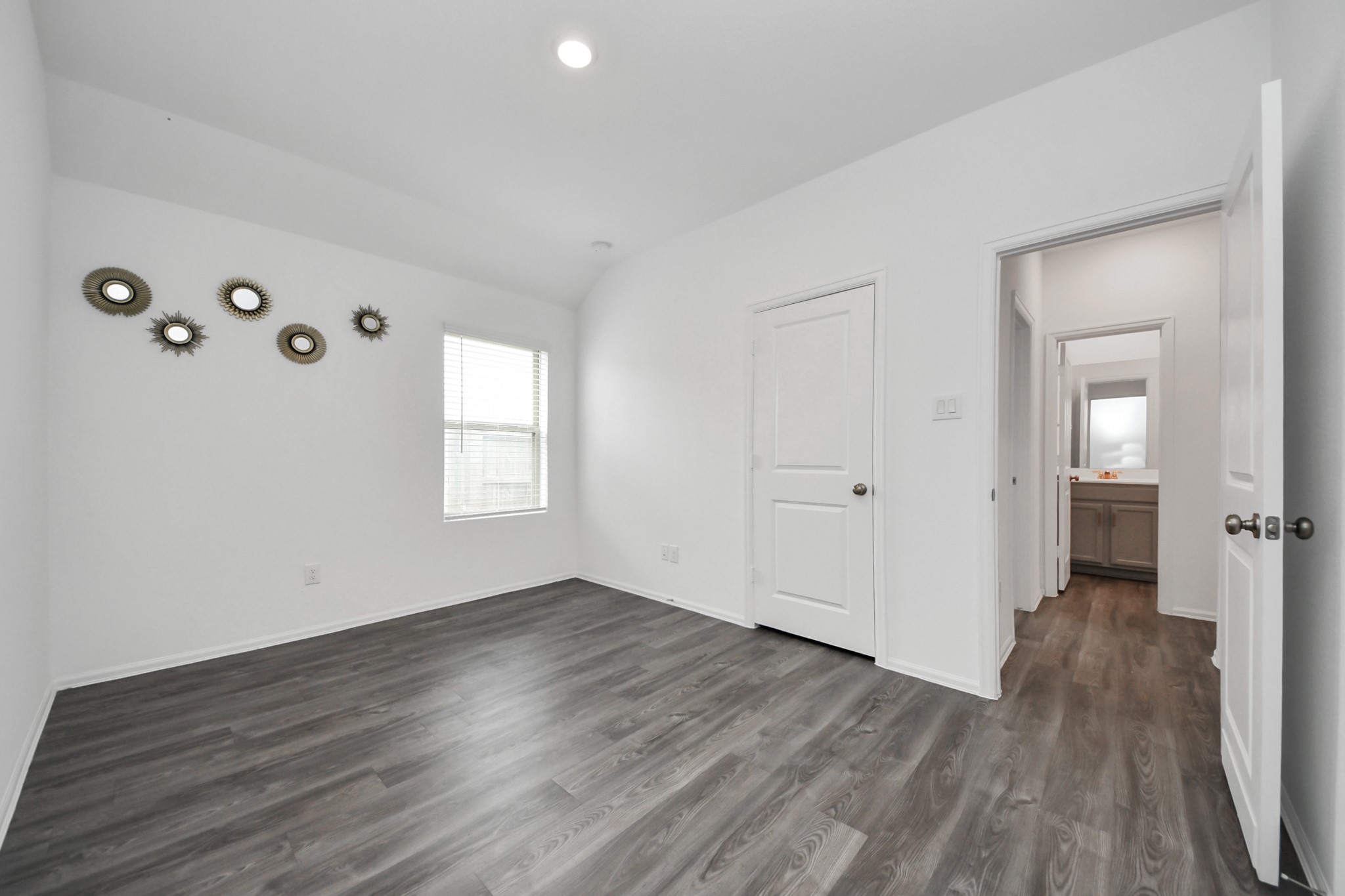 14230 Elrington Holw Trail Rosharon, TX 77583 - Photo 27 of 42 a view of an empty room with wooden floor