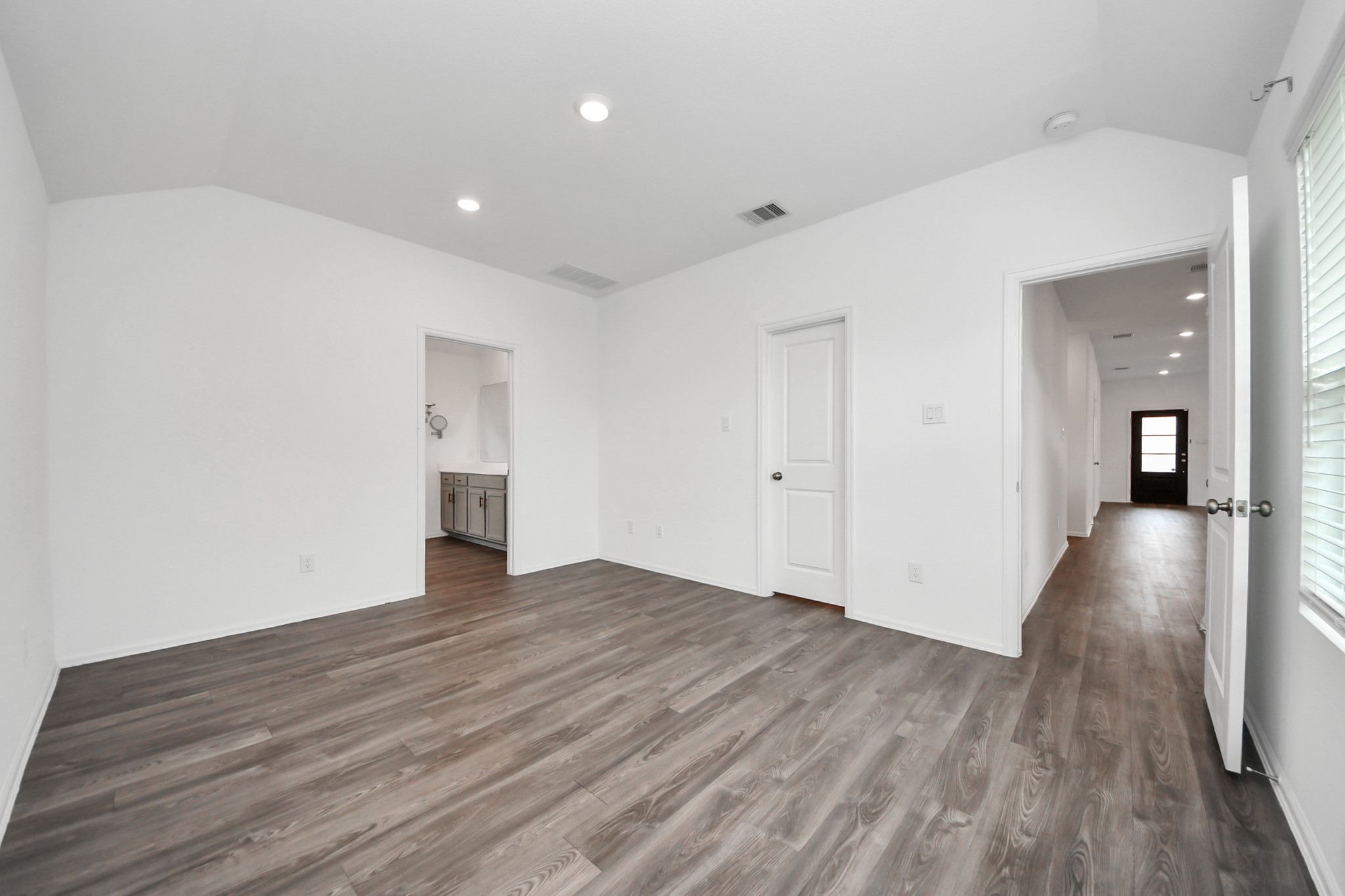 14230 Elrington Holw Trail Rosharon, TX 77583 - Photo 29 of 42 wooden floor in an empty room with wooden floor