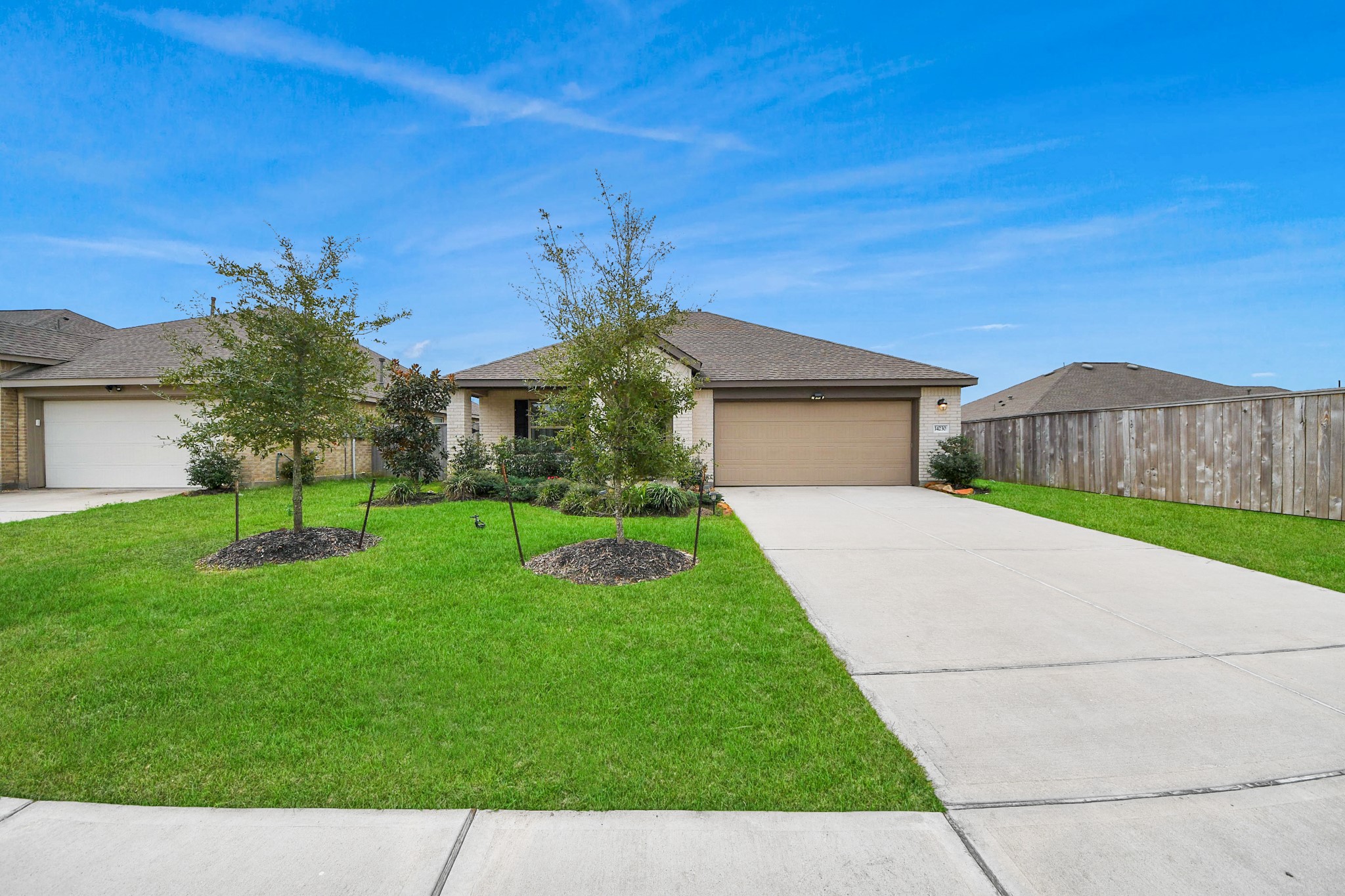 14230 Elrington Holw Trail Rosharon, TX 77583 - Photo 42 of 42 a front view of house with yard and green space