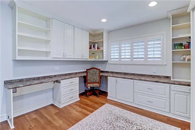 a spacious bathroom with a mirror and a shower