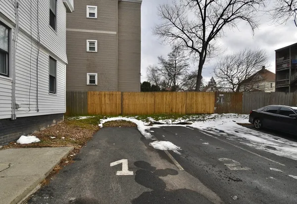 a view of a street with a house